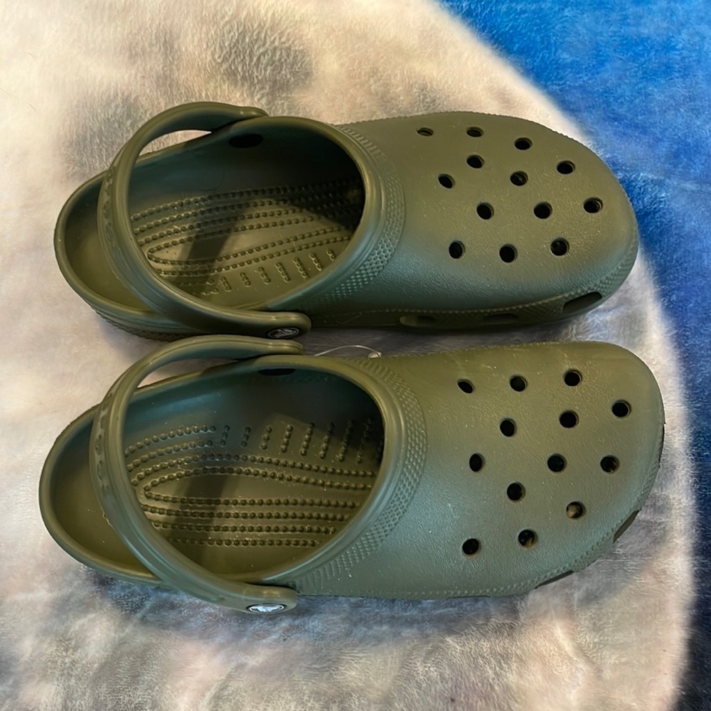 Crocs, army green, men's size 7, women's size 9.  Excellent condition